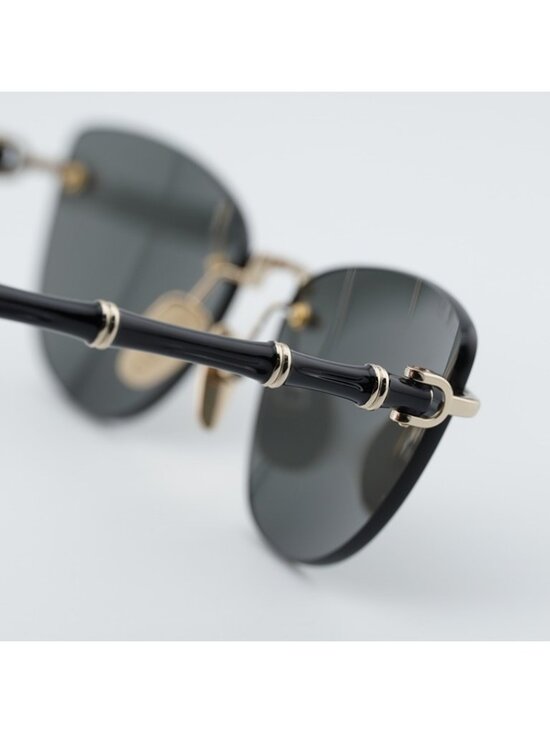 Gucci GG2063S 002 Sunglasses Shiny Endura Gold Cat Eye Frame, Grey Lenses main image 4